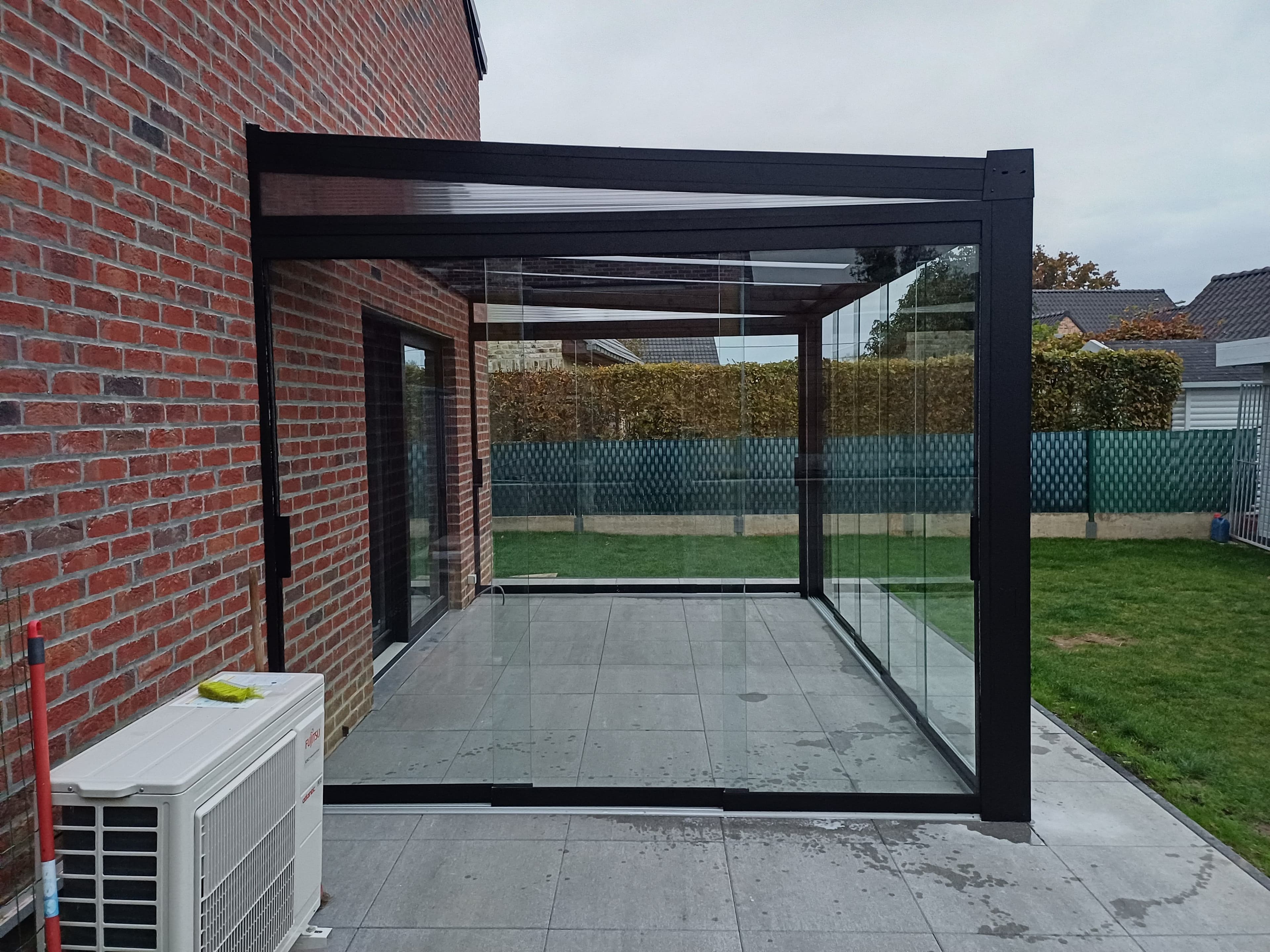 Terrasoverkapping met glazen schuifwanden in Pajottegem - foto 2